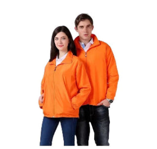 Two people wearing bright orange jackets on a white background