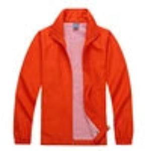 Orange jacket with a red lining on a plain background