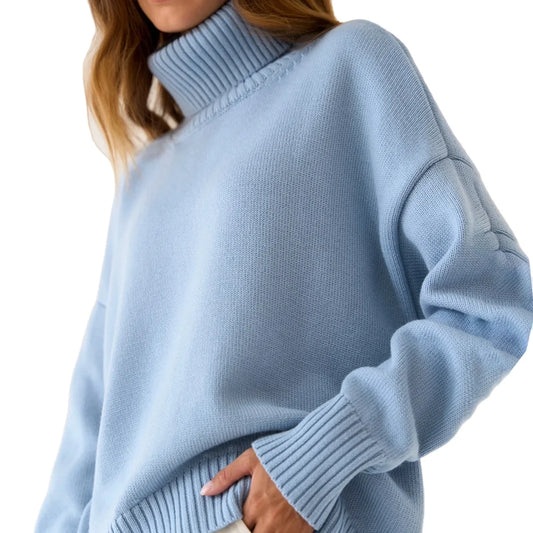 Light blue sweater worn by a person on a white background